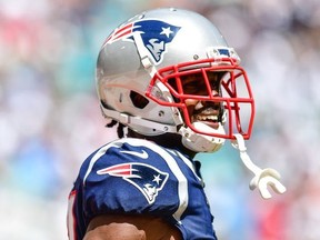 Antonio Brown of the New England Patriots looks on in the third quarter against the Miami Dolphins at Hard Rock Stadium on September 15, 2019 in Miami, Florida.