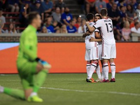 Toronto FC midfielder Marco Delgado (#8) celebrates with teammates after scoring a goal against FC Cincinnati last week. (USA TODAY SPORTS)