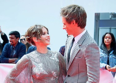 Felicity Jones (L) and Eddie Redmayne attend "The Aeronauts" premiere at the Roy Thompson Hall during the 2019 Toronto International Film Festival Day 4 on Sept. 8, 2019, in Toronto.
