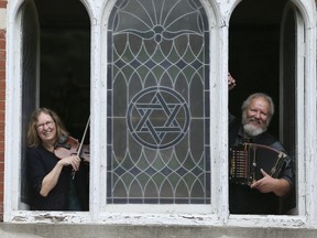 Ann Lederman and Ian Bell play music inside the Kiever Shul Synagogue on Sept. 15, 2019. (Veronica Henri, Toronto Sun)