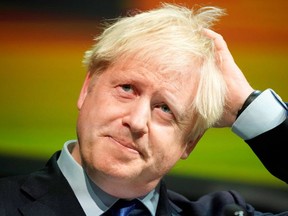 British Prime Minister Boris Johnson gestures as he delivers his speech at the Convention of the North, in the Magna Centre in Rotherham,  England, on Sept. 13, 2019. (AFP/Getty)