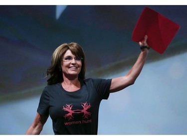 May 3, 2013: Former Alaska governor Sarah Palin waves before speaking during the 2013 NRA Annual Meeting and Exhibits at the George R. Brown Convention Center in Houston, Texas.