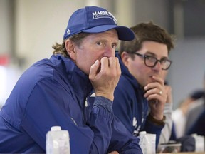 Toronto Maple Leafs coach Mike Babcock, left, and general manager Kyle Dubas watch a scrimmage game during Maple Leafs training camp in Niagara Falls, Ont., September 16, 2018. THE CANADIAN PRESS/Aaron Lynett