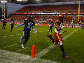 Calgary Stampeders running back Terry Williams (38) runs in a touchdown in the first half of CFL action against the Toronto Argonauts in Toronto on Friday, Sept. 20, 2019. THE CANADIAN PRESS/Cole Burston