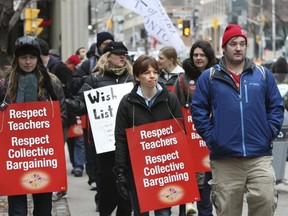 This December, 2012 file photo shows teachers demonstrating against the former Ontario Liberal government's Bill 115 which imposed limits on teachers' right to strike. (Stan Behal, Toronto Sun)