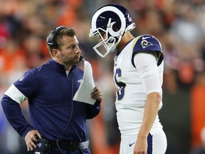 Rams head coach Sean McVay talks with QB Jared Goff during their game against Cleveland last week. (GETTY IMAGES)