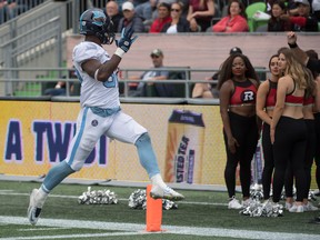 Argonauts running back James Wilder Jr. waves to the Redblacks cheerleaders as he scores a touchdown in Saturday's romp at TD Place in Ottawa. Marc DesRosiers-USA TODAY Sports