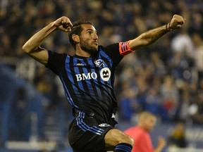 Montreal Impact midfielder Ignacio Piatti (10) reacts after scoring a goal against the Toronto FC during the first half in the Canadian Championship final at Stade Saputo in Montreal on Wednesday. 
Eric Bolte-USA TODAY Sports
