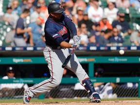Minnesota Twins designated hitter Jonathan Schoop hits a two-run home run in the seventh inning against the Detroit Tigers at Comerica Park in Detroit on Sept. 26, 2019.