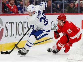 Maple Leafs defenceman Erasmus Sandin controls the puck while being chased by Red Wings' Chris Terry in the second period at Little Caesars Arena last night. Rick Osentoski/USA TODAY Sports ORG XMIT: USATSI-406689