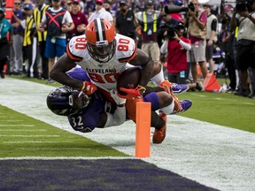 Jarvis Landry #80 of the Cleveland Browns dives for the end zone as DeShon Elliott #32 of the Baltimore Ravens defends during the second half at in Baltimore on Sunday. The Brown won the game.  Scott Taetsch/Getty Images