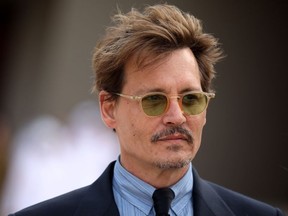 US actor Johnny Depp attends the official opening ceremony for the National Museum of Qatar, in the capital Doha on March 27, 2019. -