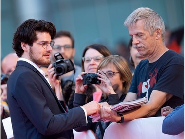 Director Daniel Roher arrives for the Opening Night Gala presentation of "Once Were Brothers: Robbie Robertson and The Band" during the Toronto International Film Festival, on Sept. 5, 2019, in Toronto.