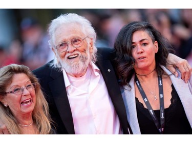 Wanda Hawkins, musician Ronnie Hawkins and guest arrive for the Opening Night Gala presentation of "Once Were Brothers: Robbie Robertson and The Band" during the Toronto International Film Festival, on Sept. 5, 2019, in Toronto.