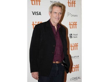 English actor Hugh Laurie arrives for the special presentation of "The Personal History of David Copperfield" during the Toronto International Film Festival, on Sept. 5, 2019, in Toronto.