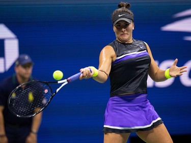 Bianca Andreescu hits a return to Belinda Bencic during their U.S. Open semifinal at the USTA Billie Jean King National Tennis Center in New York on September 5, 2019. (JOHANNES EISELE/AFP/Getty Images)