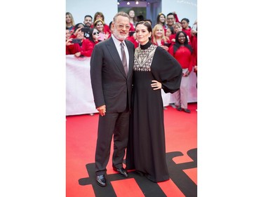 Actor Tom Hanks and director Marielle Heller arrive for the premiere of "A Beautiful Day in the Neighborhood" during the 2019 Toronto International Film Festival Day 3 
on Sept. 7, 2019 in Toronto.