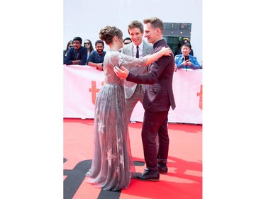 (L-R) Actors Felicity Jones, Eddie Redmayne and director Tom Harper attend 'The Aeronauts' premiere at the Roy Thompson Hall during the 2019 Toronto International Film Festival Day 4 on Sept. 8, 2019, in Toronto.