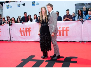 Eddie Redmayne (R) and wife Hannah Bagshawe attend "The Aeronauts" premiere at the Roy Thompson Hall during the 2019 Toronto International Film Festival Day 4 on Sept. 8, 2019, in Toronto.