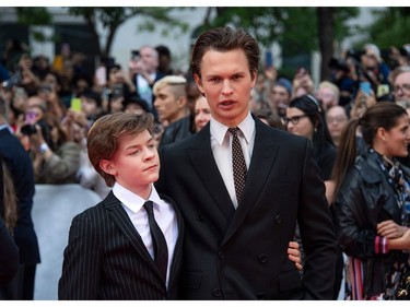 Oakes Fegley (L) and Ansel Elgort (R) attend "The Goldfinch" premiere at the Roy Thompson Hall during the 2019 Toronto International Film Festival Day 4, Sept. 8, 2019, in Toronto.