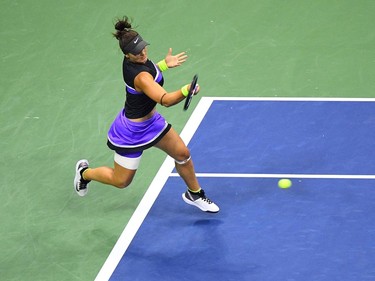 Bianca Andreescu of Canada returns a ball against Elise Mertens of Belgium during their women's Singles Quarterfinals match at the 2019 US Open at the USTA Billie Jean King National Tennis Center in New York on September 4, 2019. (Johannes Eisele/AFP/Getty Images)