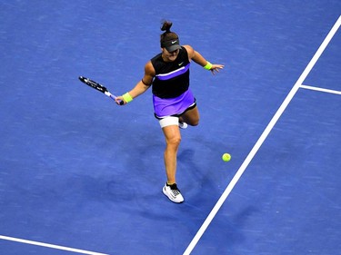 Bianca Andreescu of Canada returns a ball against Elise Mertens of Belgium during their women's Singles Quarterfinals match at the 2019 US Open at the USTA Billie Jean King National Tennis Center in New York on September 4, 2019. (Johannes Eisele/AFP/Getty Images)