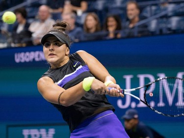 Bianca Andreescu of Canada hits a return against Elise Mertens of Belgium during their women's Singles Quarterfinals match at the 2019 US Open at the USTA Billie Jean King National Tennis Center in New York on September 4, 2019. (Don Emmert/AFP/Getty Images)