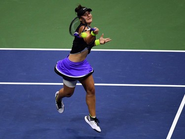 Bianca Andreescu of Canada hits a return against Elise Mertens of Belgium during their women's Singles Quarterfinals match at the 2019 US Open at the USTA Billie Jean King National Tennis Center in New York on September 4, 2019. (Johannes Eisele/AFP/Getty Images)