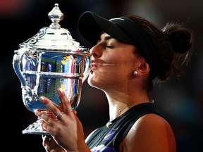 Bianca Andreescu of Canada kisses the championship trophy during the trophy presentation ceremony after winning the Women's Singles final against Serena Williams of the United States on day thirteen of the 2019 US Open at the USTA Billie Jean King National Tennis Center on Sept. 7, 2019 in New York City.