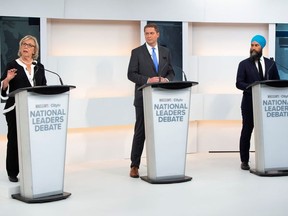 Green Party leader Elizabeth May, Conservative leader Andrew Scheer and New Democratic Party (NDP) leader Jagmeet Singh take part in the Maclean's/Citytv National Leaders Debate in Toronto, Ontario, Canada September 12, 2019. Frank Gunn/Pool via REUTERS ORG XMIT: TOR501