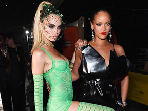 Cara Delevingne with Rihanna at her fashion show. (Screengrab/Instagram)