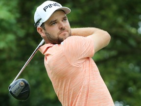 Corey Conners plays his shot from the fourth tee during the third round of the BMW Championship at Medinah Country Club No. 3 on Aug. 17, 2019 in Medinah, Ill. (Sam Greenwood/Getty Images)