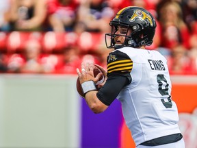 Hamilton Tiger-Cats quarterback Dane Evans drops back to pass against the Calgary Stampeders in the first half during a CFL game at McMahon Stadium in Calgary, Sept. 14, 2019. (Sergei Belski-USA TODAY Sports)