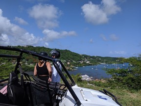 A dune buggy tour with Sun Hunters takes visitors to an area in the southern coast of Grenada with view a of Woburn Bay. (Ling Hui/Postmedia Network)