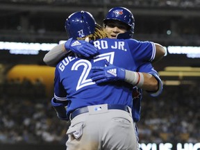 Vladimir Guerrero Jr. and Bo Bichette are two reasons to keep watching the Jays. USA TODAY