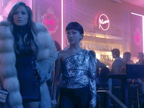 Jennifer Lopez, left, and Constance Wu star in "Hustlers."