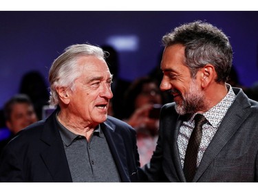 Director Todd Phillips and Robert De Niro interact at the premiere of "Joker" at the Toronto International Film Festival (TIFF) in Toronto, Ontario, Canada September 9, 2019. REUTERS/Mario Anzuoni ORG XMIT: SIN519