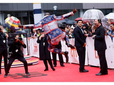 Rob Morgan jumps as he arrives for a gala presentation of "Just Mercy" at the Toronto International Film Festival in Toronto, Sept. 6, 2019.