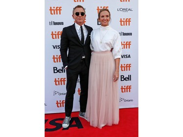 Cast members Daniel Craig and Toni Collette arrive for the special presentation of "Knives Out" at the Toronto International Film Festival in Toronto on Sept. 7, 2019.