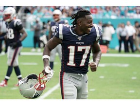 Sep 15, 2019: Miami Gardens, FL, USA; New England Patriots wide receiver Antonio Brown (17) celebrates in the fourth quarter against the Miami Dolphins at Hard Rock Stadium. The Patriots defeated the Dolphins 43-0.