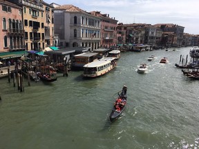 A view from the Rialto Bridge. You can also cruise the Grand Canal in Venice by a water bus. (Lance Hornby/Toronto Sun)
