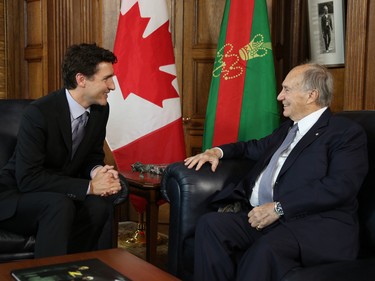 Justin Trudeau is pictured with Aga Khan. Trudeau was found to have violated ethics rule's in 2017 after he accepted a trip to Khan's island in the Bahamas. Trudeau did not advise the conflict of interest commissioner of his friendship with Khan and admitted to using Khan's personal helicopter.