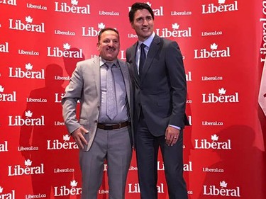 Justin Trudeau and Amin El-Maoued are pictured on a stage together in June, 2018. El-Maoued was accused of being an anti-Semite for his role in a 2017 rally he allegedly led where anti-Semitic chants such as "Hitler and Israel are the same thing" and other anti-Semitic views were expressed. El-Maoued received a community service award -- presented to him on behalf of Trudeau -- but had it taken away following backlash from the Jewish community. El-Maoued wrote in a Facebook post he "condemned anti-Semitism" as well as some of the "statements" made at the rally.