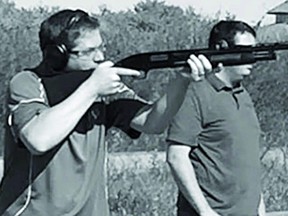 The latest Liberal attack ad includes images of Conservative Leader Andrew Scheer and some of that party's MPs legally firing guns at a range. (screengrab from Liberal Party's ad)