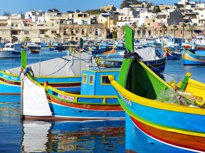 According to tradition, the colours of these Maltese fishing boats represent a fisherman's home village. (Gretchen Strauch)