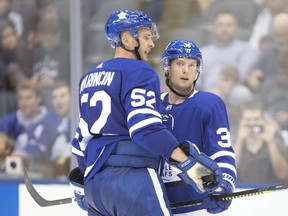 Martin Marincin (left) and Rasmus Sandin has been an effective defensive pairing for the Maple Leafs during the pre-season. (Chris Young/The Canadian Press)