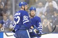 Martin Marincin (left) and Rasmus Sandin has been an effective defensive pairing for the Maple Leafs during the pre-season. (Chris Young/The Canadian Press)