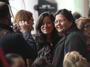 Independent Member of Parliament Jody Wilson-Raybould, centre,  poses for a photo with supporter following ceremonies marking the release of the Missing and Murdered Indigenous Women report in Gatineau, Que., June 3, 2019. (THE CANADIAN PRESS/Adrian Wyld)