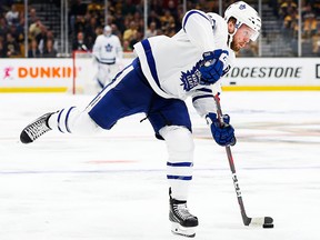 Morgan Rielly of the Toronto Maple Leafs shoots the puck against the Boston Bruins during the Stanley Cup Playoffs at TD Garden on April 13, 2019 in Boston. (Adam Glanzman/Getty Images)