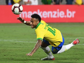 Neymar of Brazil stumbles during the international friendly against Peru at the Los Angeles Memorial Coliseum, in Los Angeles on September 10, 2019.